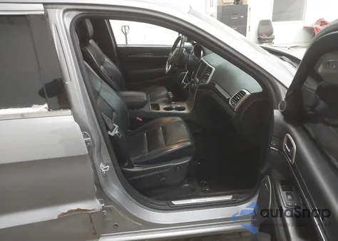 2015 Jeep Grand Cherokee Overland из США, поврежденный, VIN 1C4RJECG5FC957578